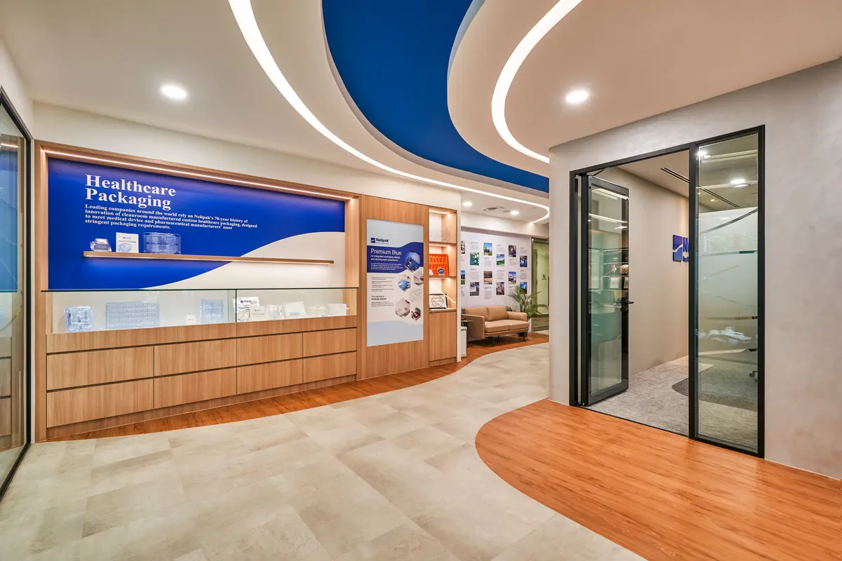 Cleanroom office and workspace featuring custom office renovation contractor at Nelipak Healthcare Packaging Singapore.